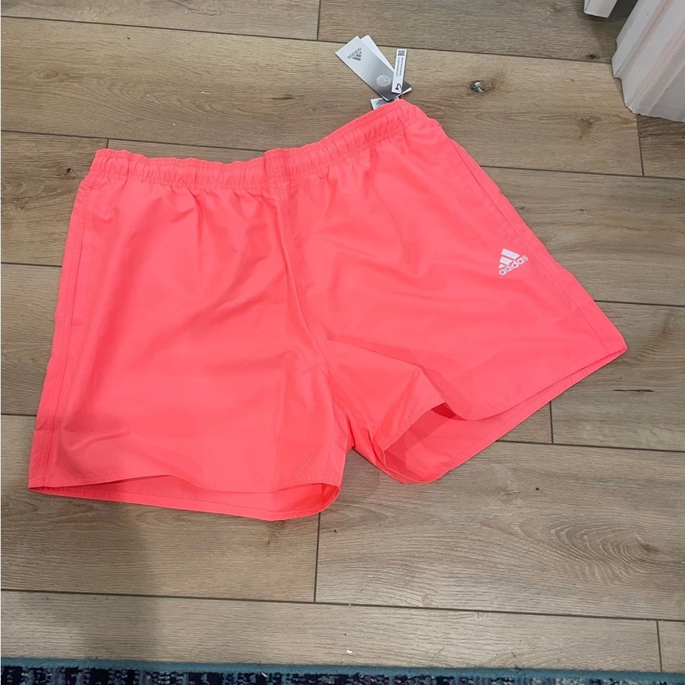 NWT mens size xl 5” inseam neon coral shorts between 
pink/orange